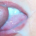 Cum-coated lips and teeth